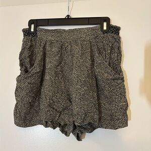 Tan and black cotton shorts.